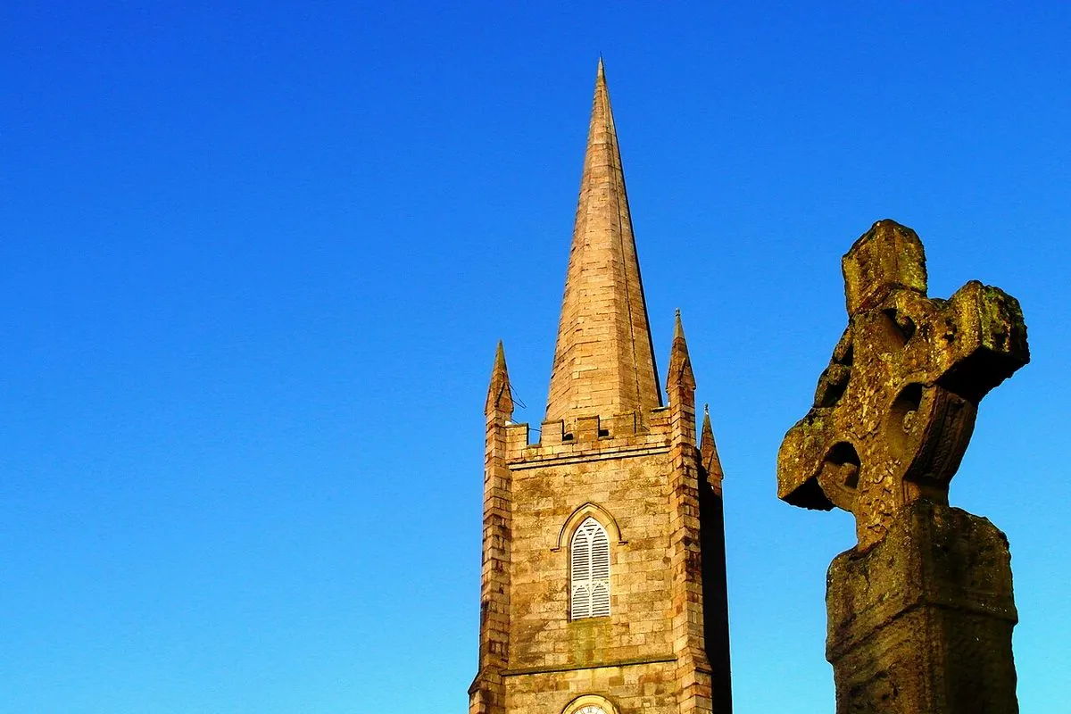 Clones high cross and church spire in sunshine