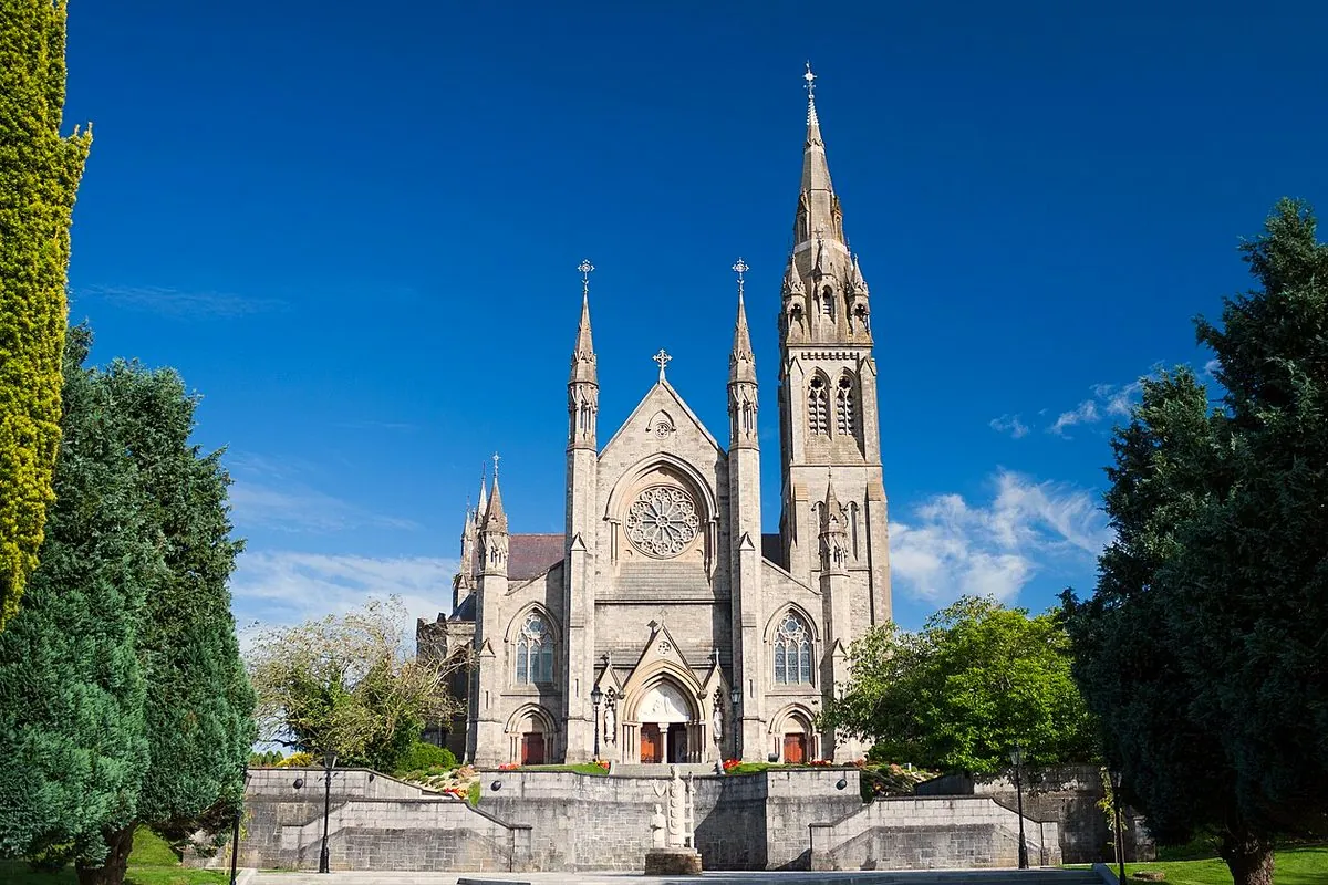 St Macartan's Cathedral spires under a blue sky