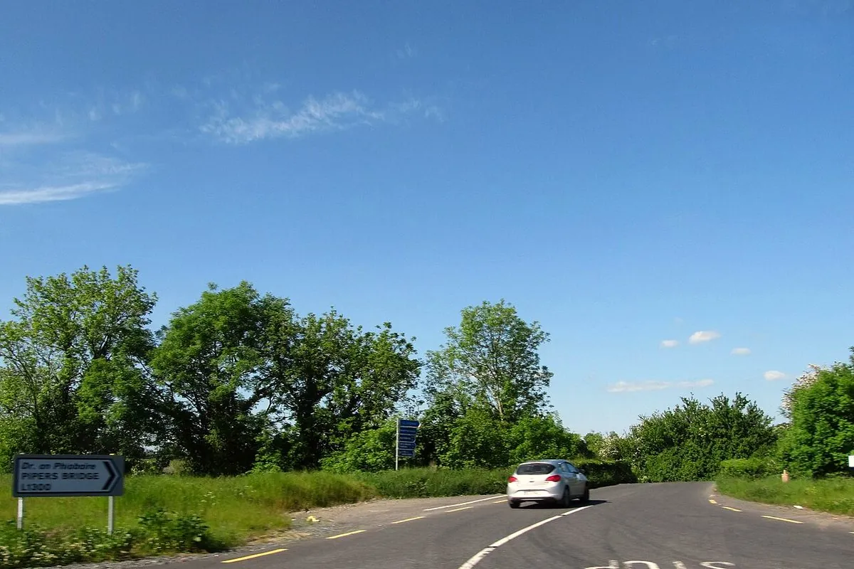 The L1300 Piper's Bridge Road under a blue sky